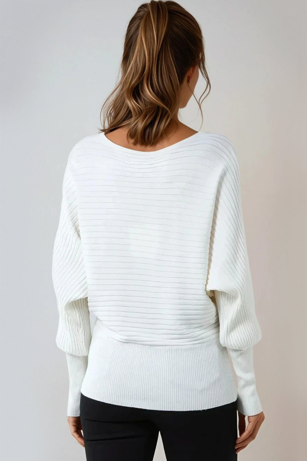 Side view of alabaster ivory bishop sleeve jumper relaxed silhouette