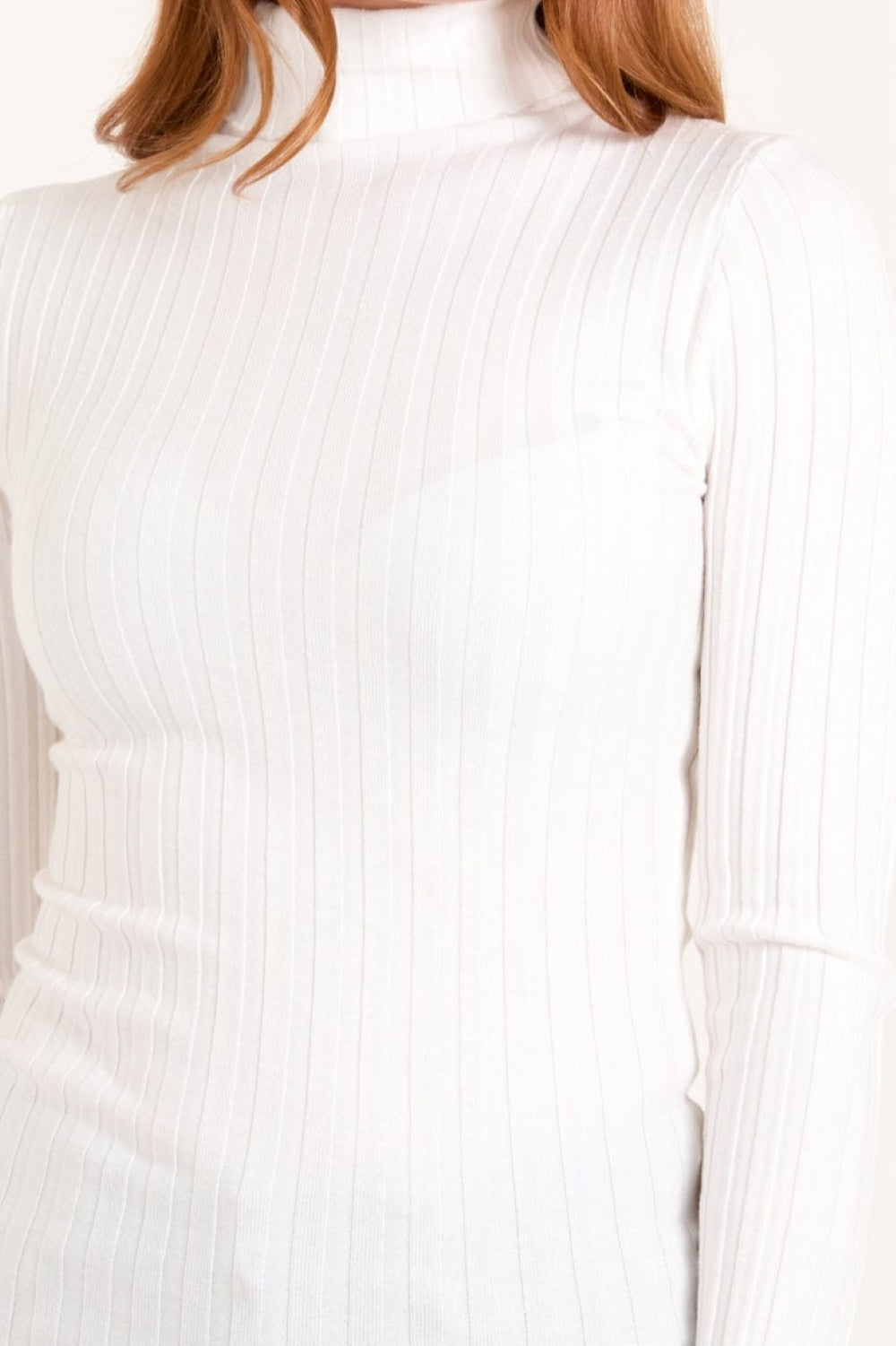 Ribbed knit texture and roll neckline on Lyra jumper