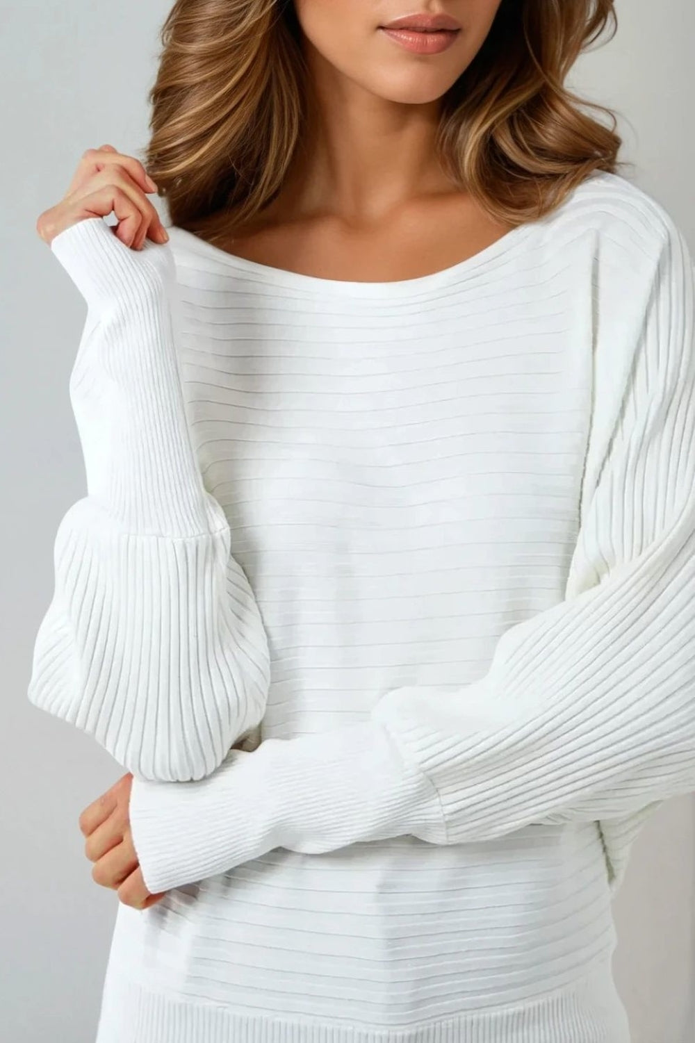 Ribbed knit texture on alabaster ivory bishop sleeve jumper