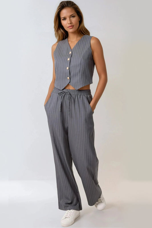 Linear Motion wide-leg trousers in charcoal pinstripe by SÈVINE
