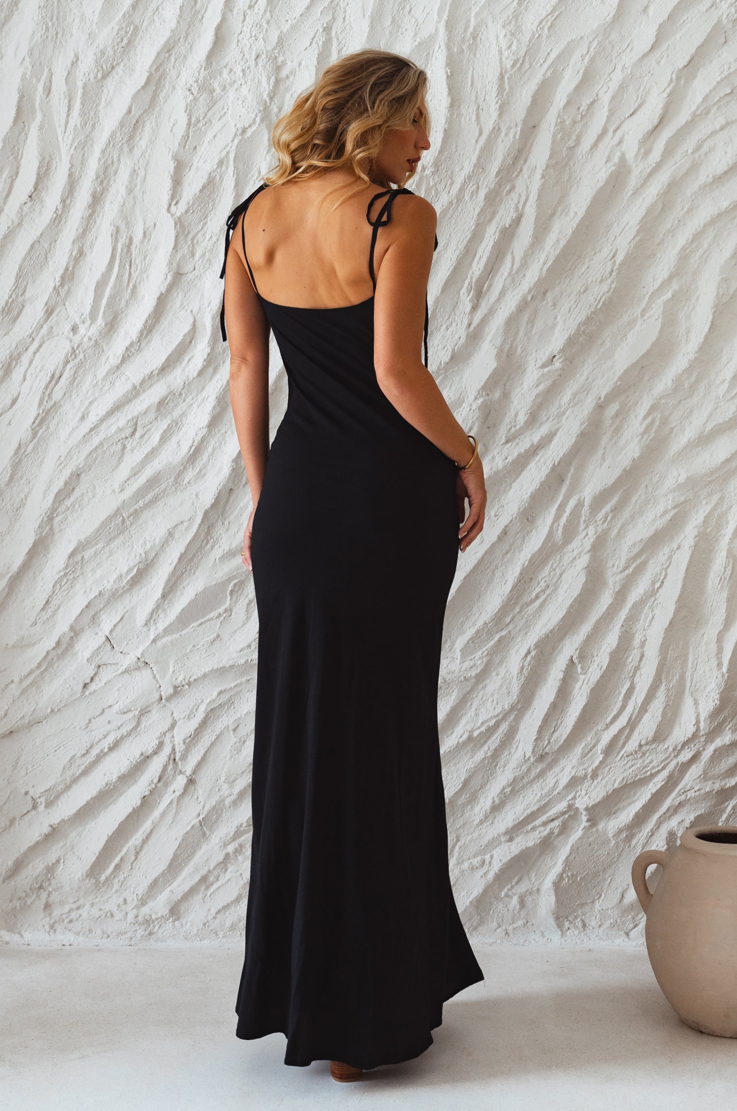 Fluid black maxi slip dress with tie shoulder straps