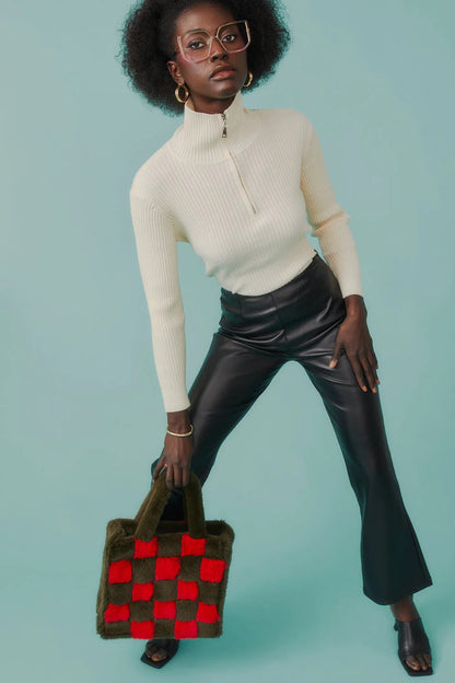 Ribbed knit texture and funnel neckline on Aura jumper