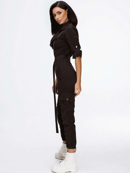 Asymmetric zip and cargo pocket detail on Kael jumpsuit