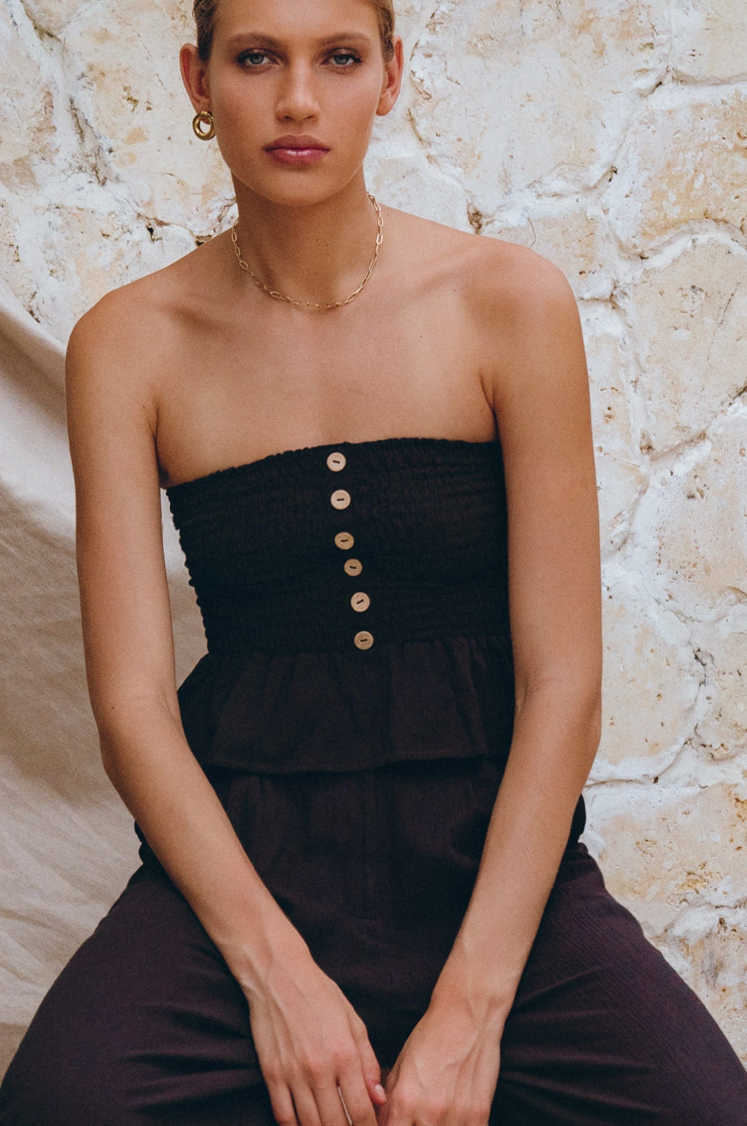 Wooden button detail on midnight indigo shirred linen bandeau