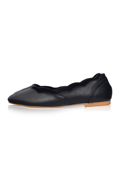 Scalloped leather edge and stitching on Milan ballet flats
