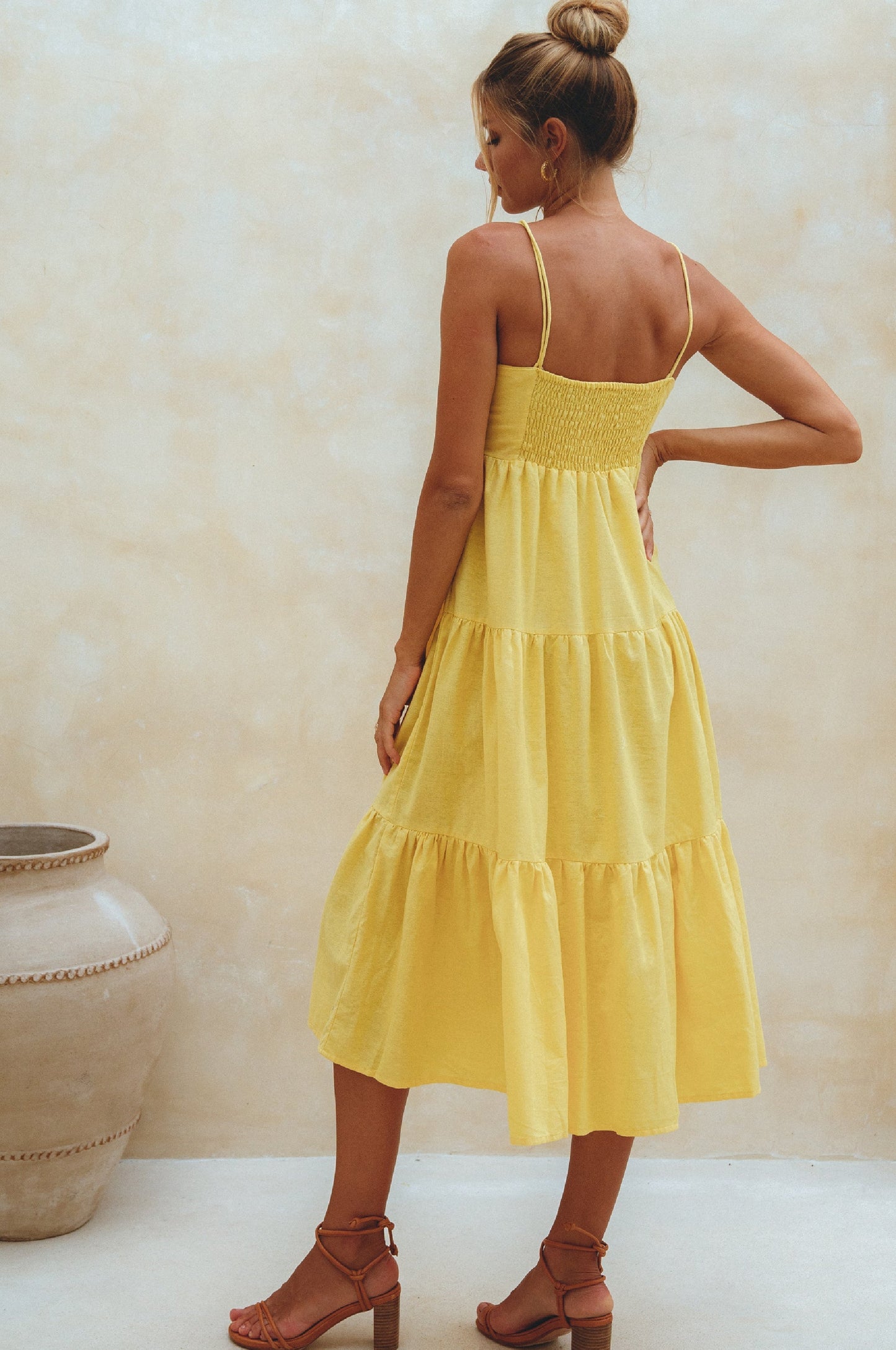 Flowing tiered linen midi dress with adjustable straps