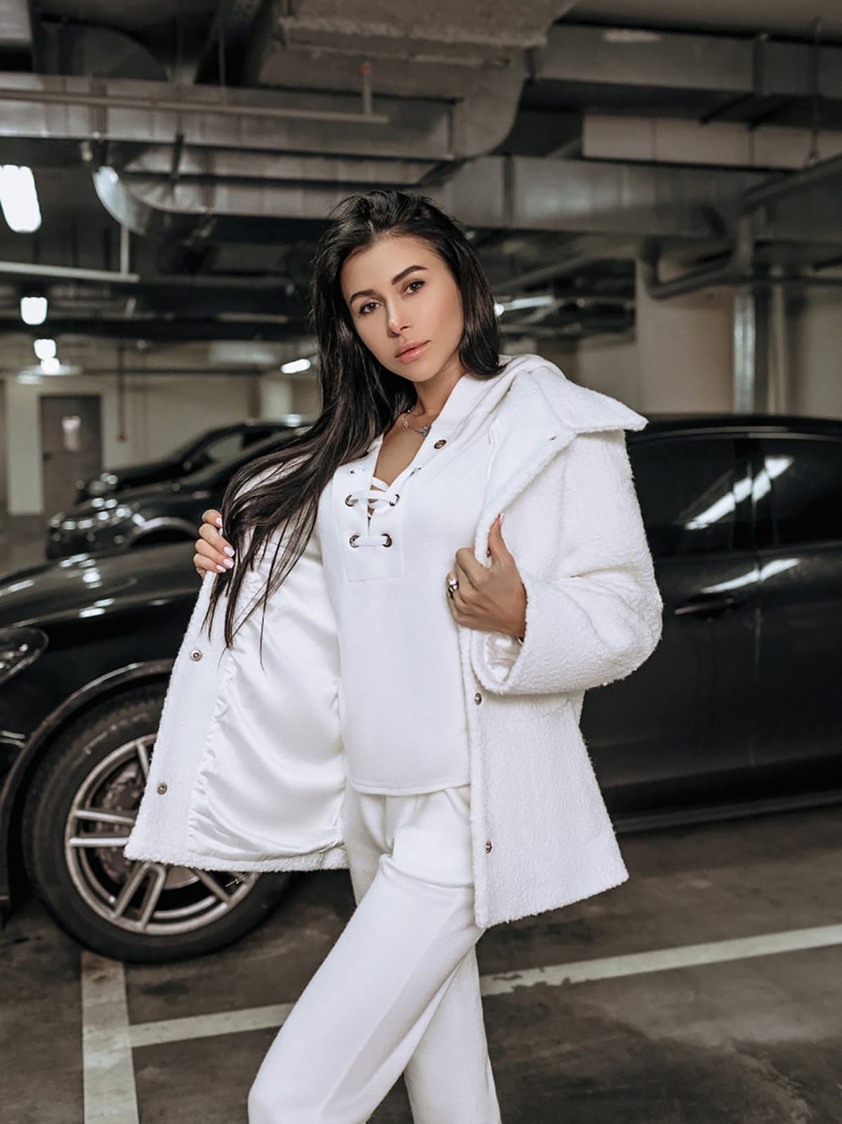 Relaxed fit ivory short coat with press stud fastening