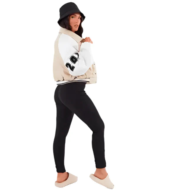 Women’s beige leather varsity bomber with ribbed cuffs